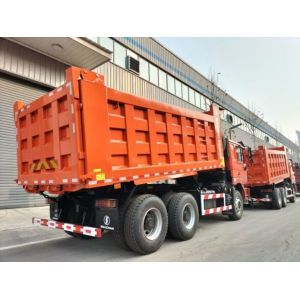 Neon Red Dump Truck 20 Cubic Yards Capacity MAN Axle Collision Mitigation System