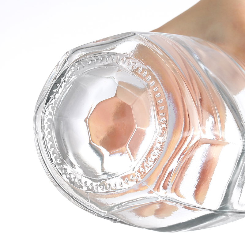 Aluminum Plastic PP Collar Material 500 ml Transparent Customized Embossed Liquor Bottle