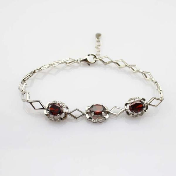 Sterling Silver 6x8mm Created Garnet and Clear Cubic Zircon Link Tennis Bracelet