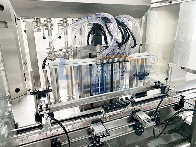 PLC Control Auto Liquid Filling Machine Anti Corrosive SUS304 Material