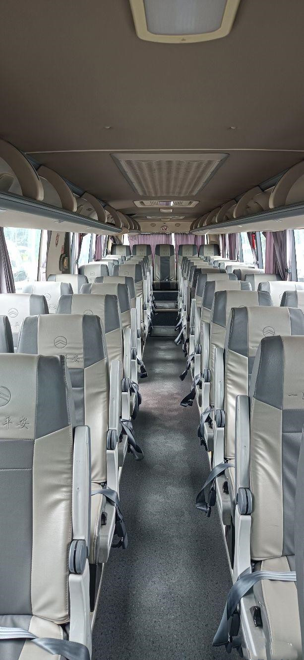 Used Tour Bus For Africa Used Golden Dragon Bus Yuchai Rear Engine 233kw 53seats Euro IV Airbag Chassis Low Kilometer