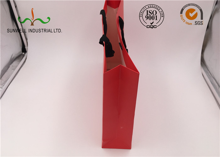 Red Coated Paper Printed Gift Bags With Handles For Cosmetics Packaging