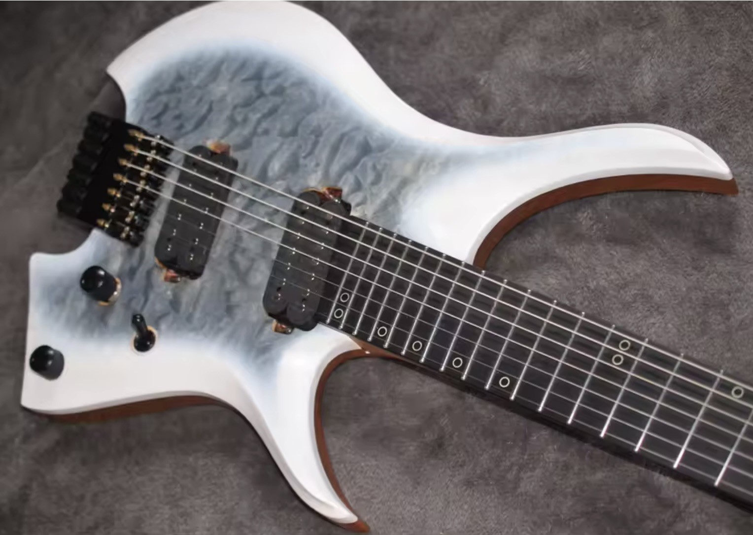 2025 Fanned Frets 7 Strings Headless Electric Guitar White Color with Eye Poplar 5-ply Roasted Maple