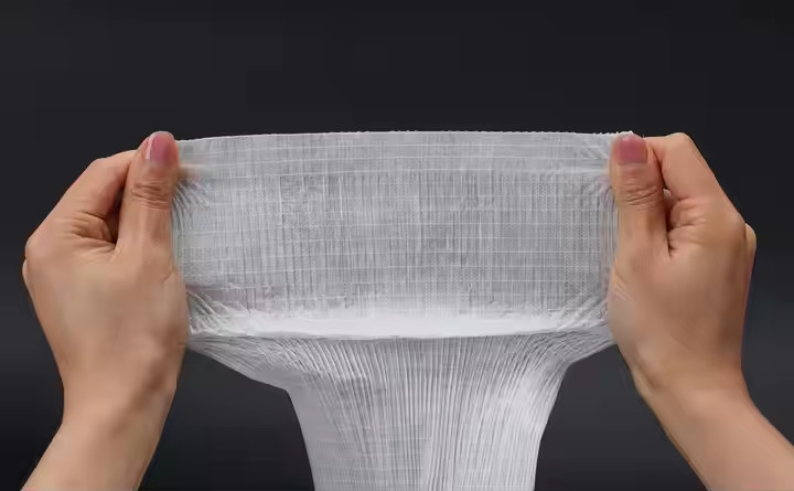Breathable Waistband Baby Diaper Women Pad Raw Materials Laminated Non-Woven Fabric Roll In Plain Pattern Or Dyed Styles