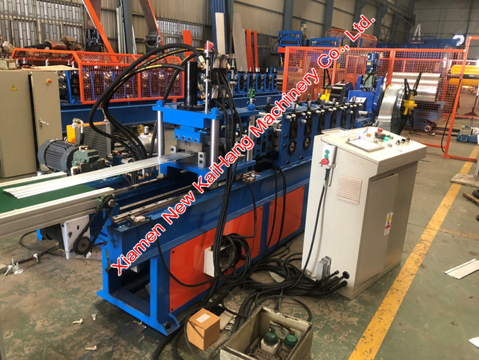Roll forming machine, boltless roofing, seam-lok, roofing profile, fixing clip