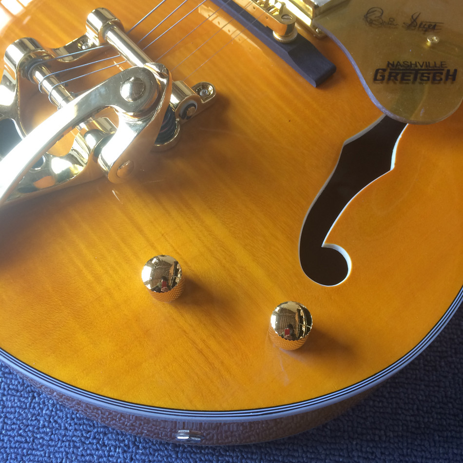 New style high-quality hollow body jazz electric guitar, Double F holes,Tremolo system ,Flame Maple top