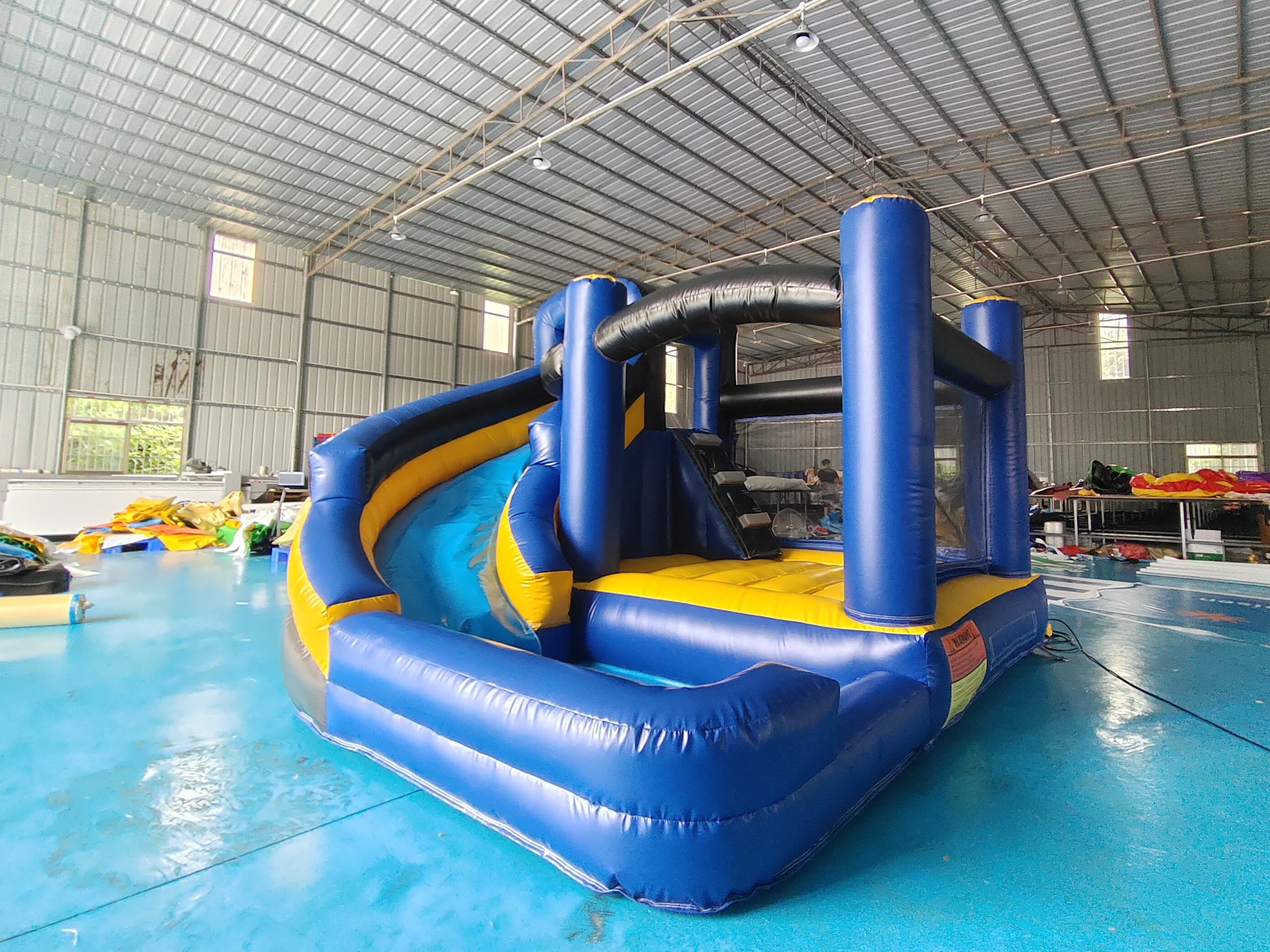 Fireproof Commercial Inflatable Bouncer Moonwalk Cartoon Theme With Rotary Slide Combo