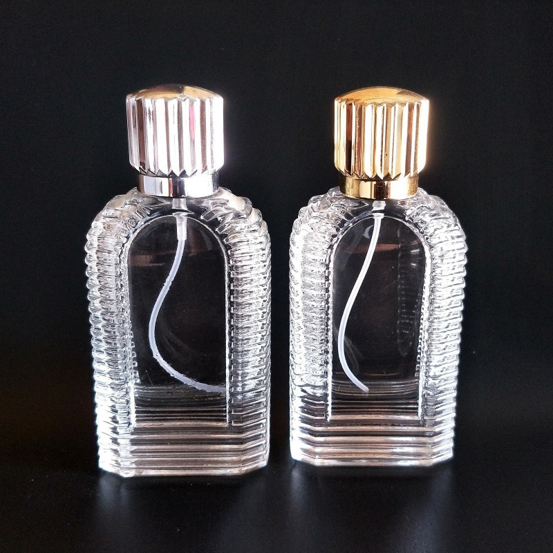 High Grade 60ml Carved Shaped Glass Perfume Bottle With Thick Bottom Made Of Crystal White Material
