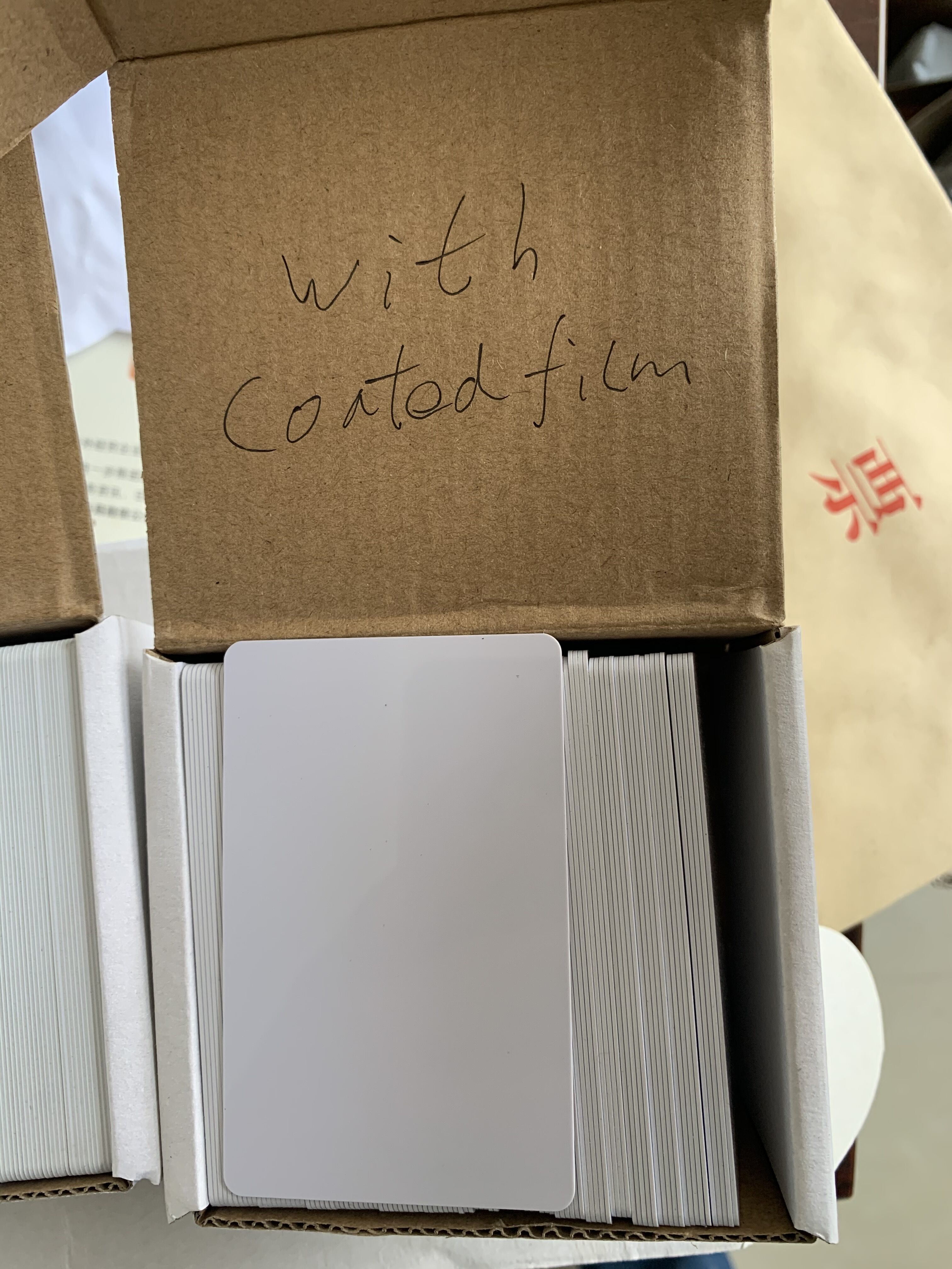 PLASTIC WHITE BLANK THERMAL PRINTING PVC ID CARD with coated film FOR Zebra/Evolis/Fargo/Thermal Printer from China