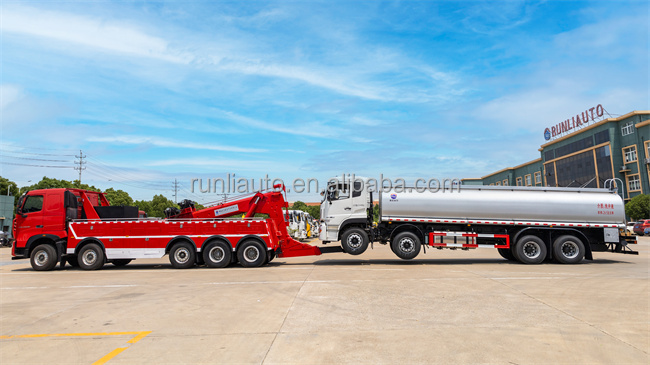China Sinotruk Howo Flatbed Truck Tow Truck Tilt Tray Towing Joint 40 Tons Rotator Tow Truck