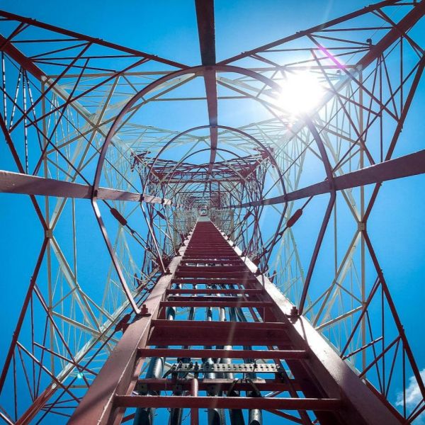 Steel tower 4 Legged Angular Steel Tower designed for telecom featuring robust construction and compliance with international design codes