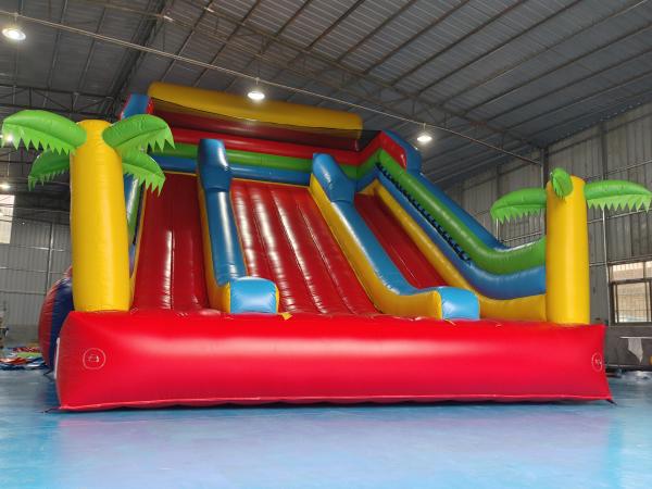 New Design Tarpaulin Fireproof Commercial Inflatable High Slide Palm Theme Giant