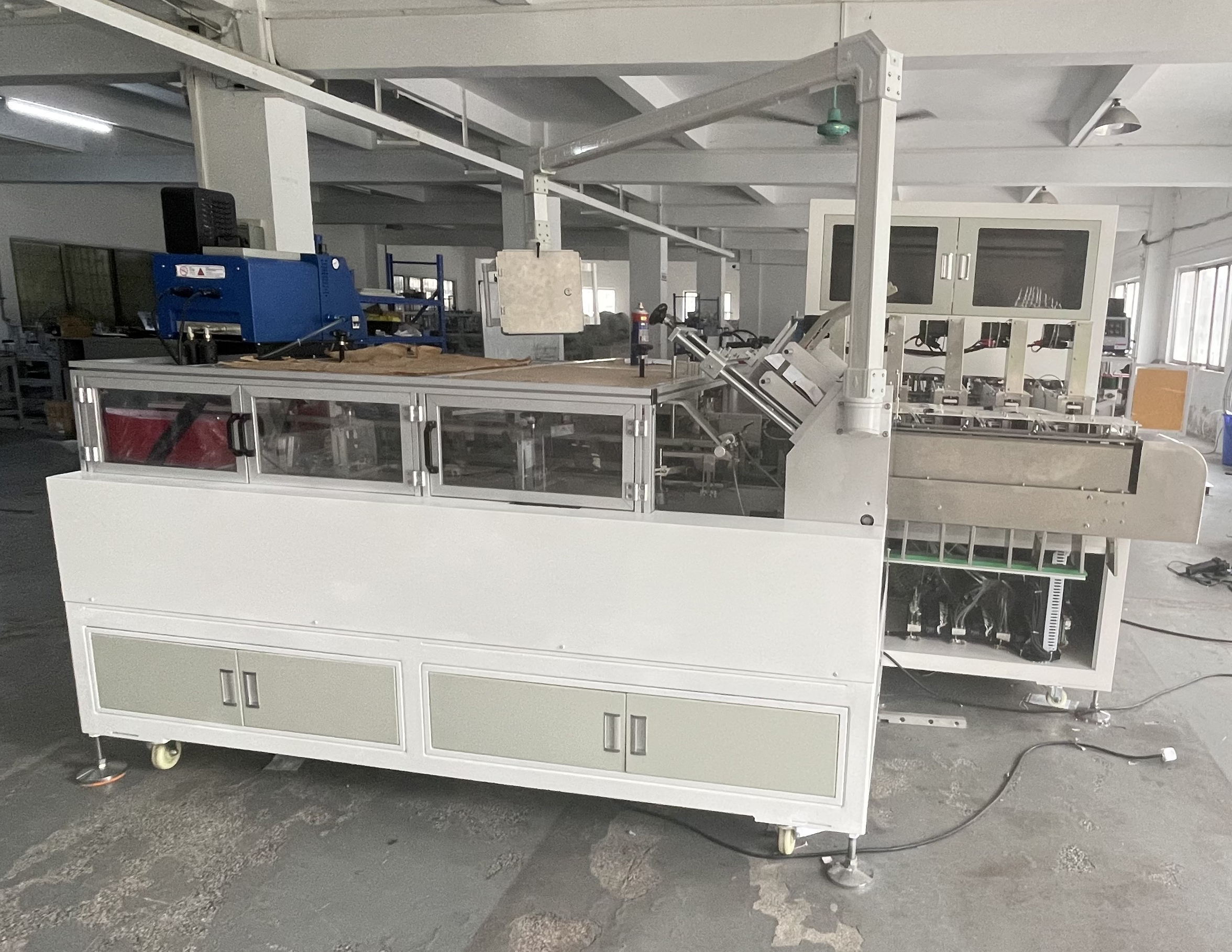 High Speed Automatic 3ply Mask Packing Machine 50pcs Face Mask Box Cartoning Machine