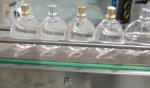 Electric Perfume Bottle Filling Capping and Labeling Machine for Automatic