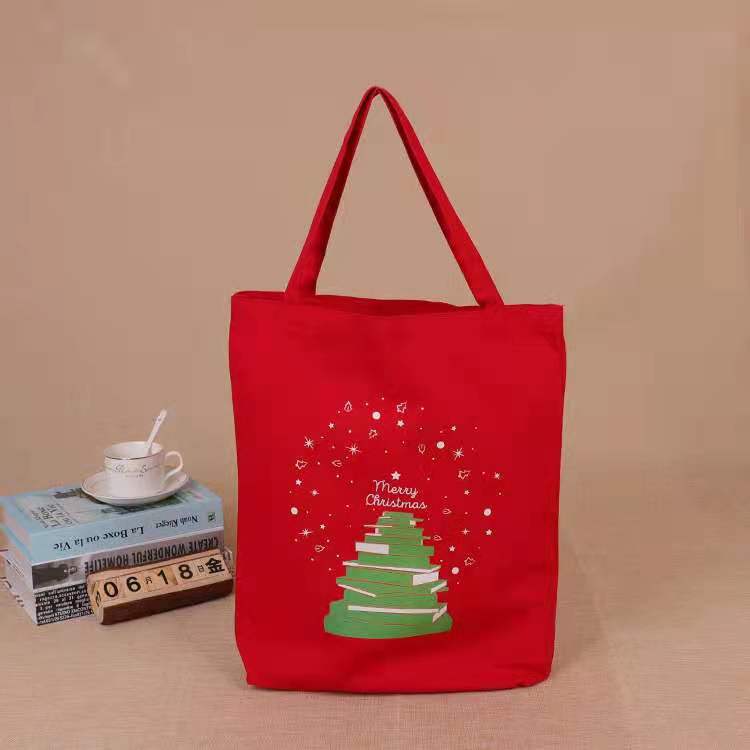 2021 hot selling promotional customized Christmas canvas tote bag reusable Santa shopping bag handbag gift for kids
