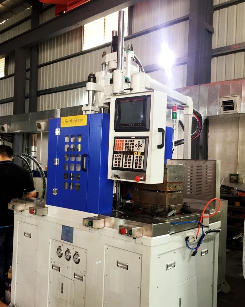 China 120T Double Slide Table Vertical Injection Molding Machine For High Volume Production on sale