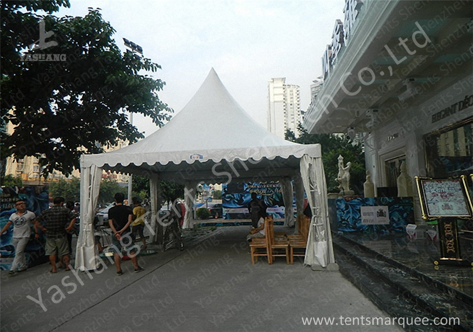Transparent Soft Fabric Window High Peak Tents on the Concrete Ground