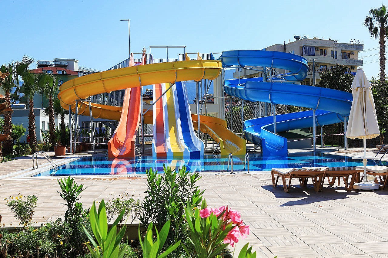 Aqua Theme Park Swimming Pool Games Rides Fiberglass Water Slide For Adults