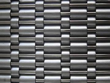Woven wire mesh with 6.15mm weft pitch.