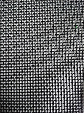 A piece of rectangular black crime safe mesh with uniform mesh holes.
