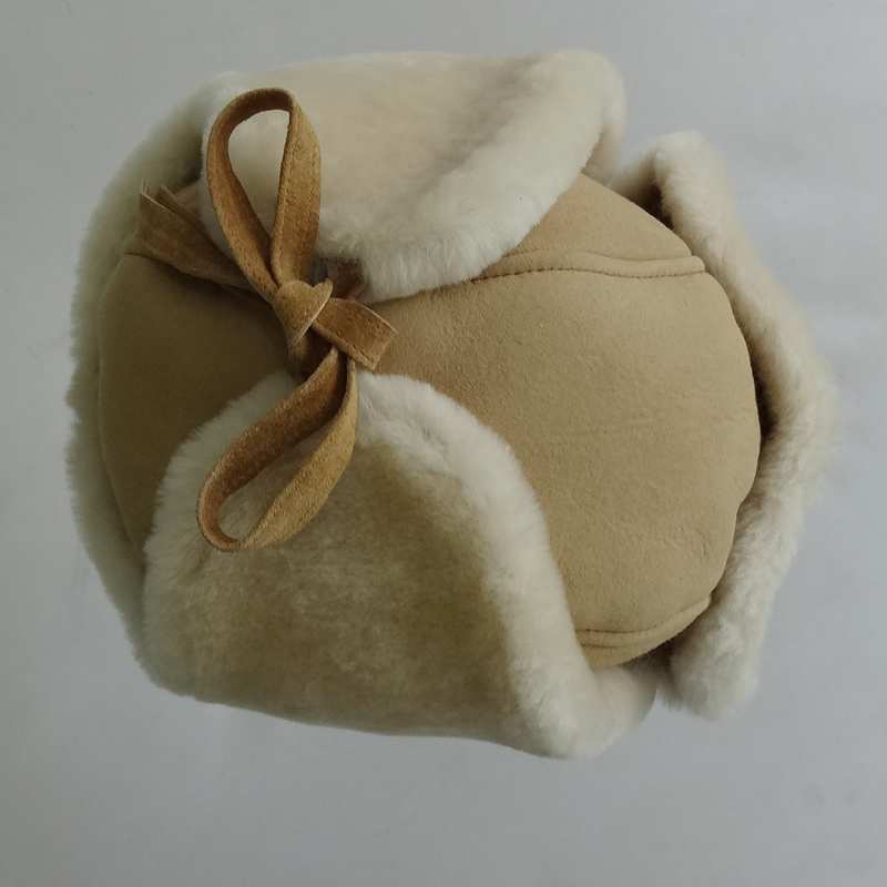 The queen of quality sheepskin trapper winter hat with ear flaps