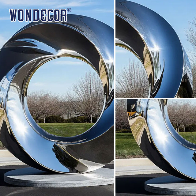 Large outdoor park shaped twisted ring stainless steel sculpture