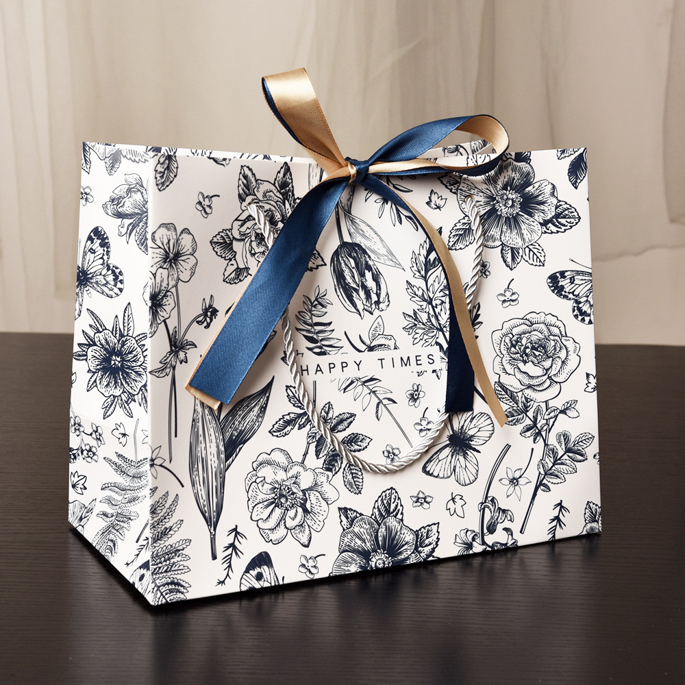 Luxury Custom Paper Bags With Customized CMYK Print And Bow Handle