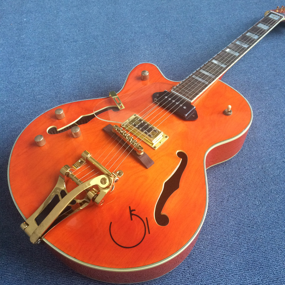 Hollow body jazz electric guitar, Double F holes,Ebony Fingerboard,Tremolo system,white guitar