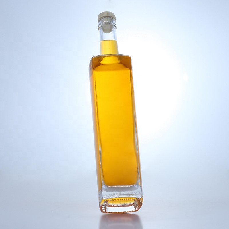 700ml High Flint Round Shape Liquor Glass Bottle with Custom Logo and Cork Top Finish