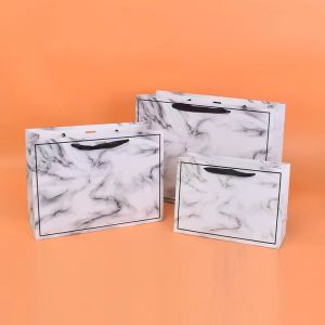  20*28cm 26*35cm 32*43cm Cosmetic Paper Bags With Ribbon Handles Manufactures