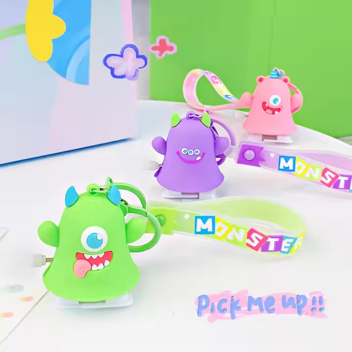 Monster Family Bag Toy Keychain Light Rubber With Gravure And Offset Printing