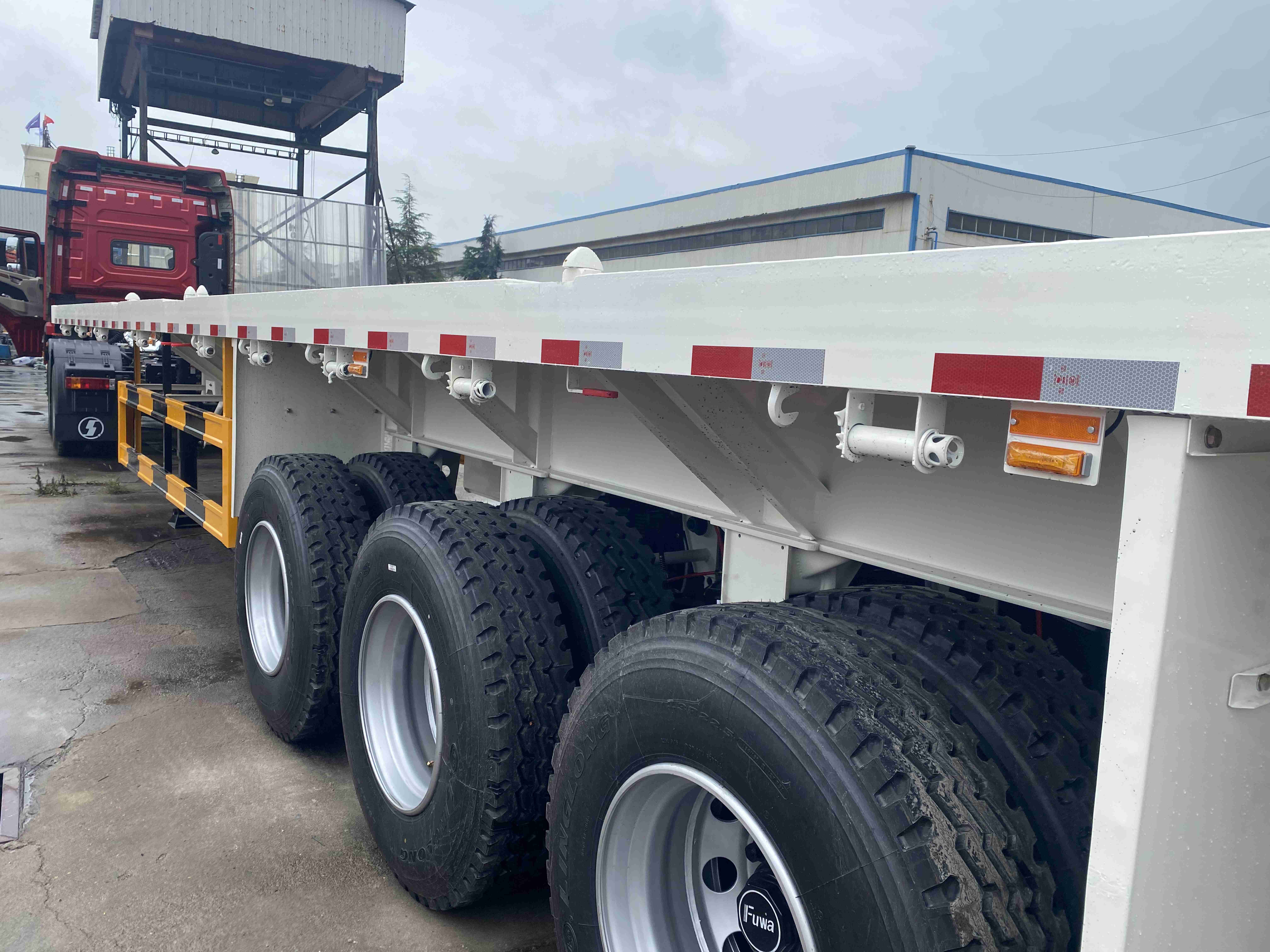 Brand new flatbed semi trailer 70ton 3 4 axles pan trailer Container Semi truck trailer 40ft 12metre for sale