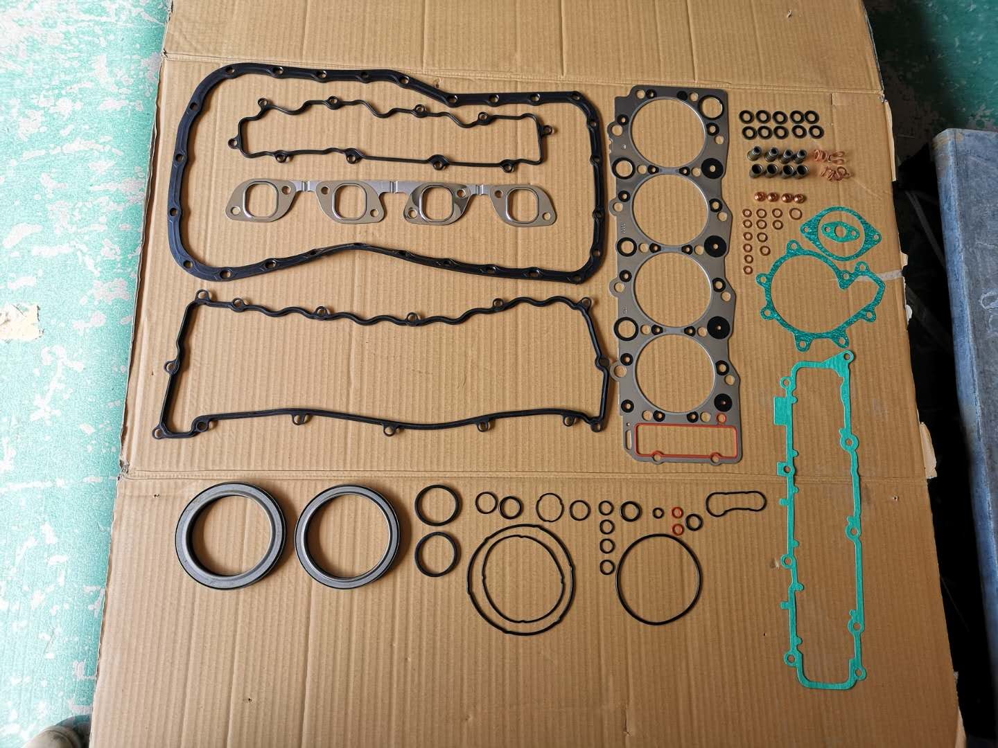 ORIGIN PARDS 4HG1 Engine Overhaul Gasket Kits 5878140110 NPR NQR Parts Sliver White Head Gasket