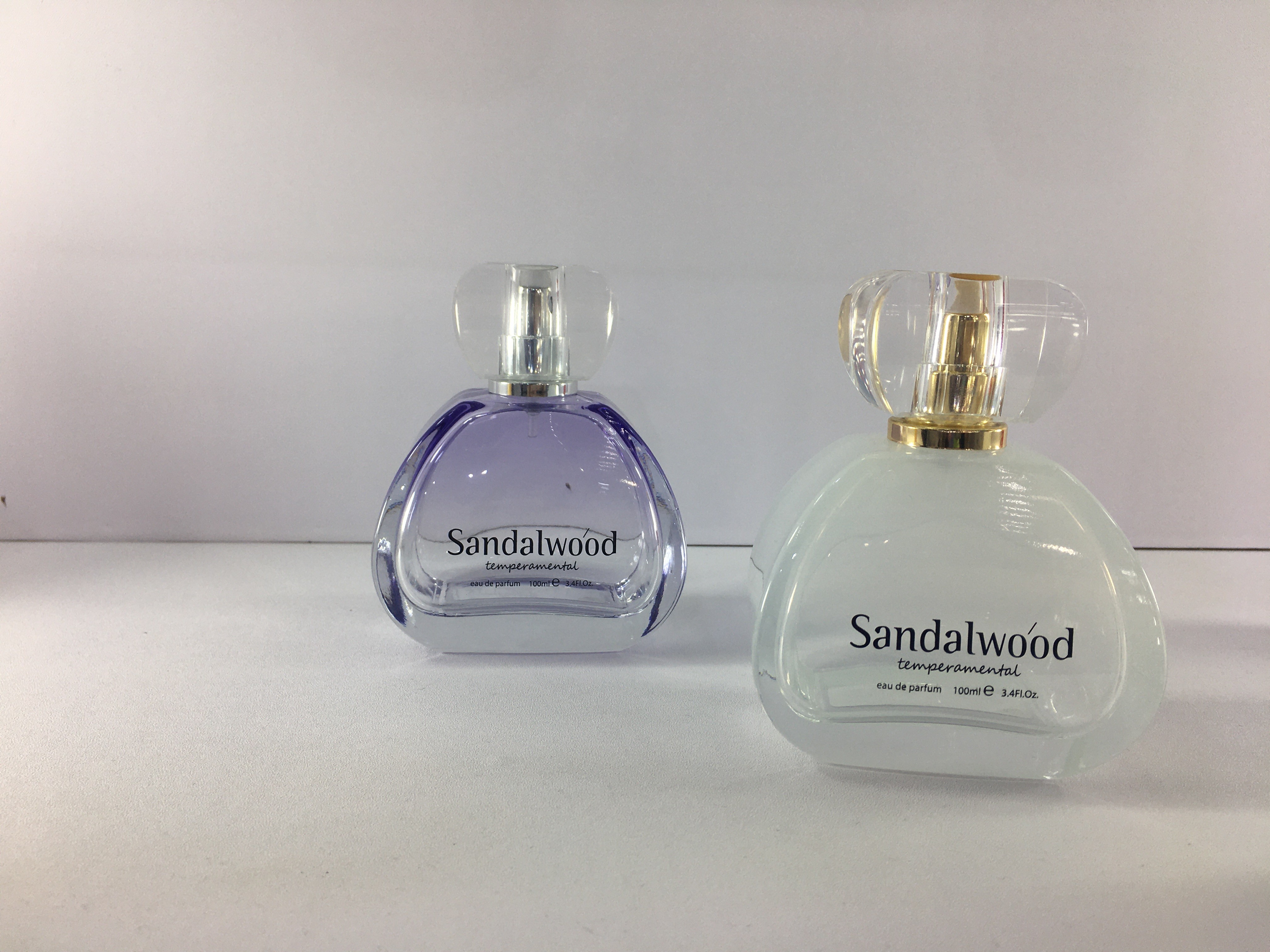 Unique Shape 110ml Luxury Perfume Bottles Transparent Color Surlyn Cap