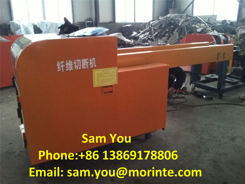 Waste yarn and fabric cutting machine for recycling purpose