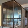 Buy cheap Clothing store display rack stainless steel drawing mirror titanium gold clothes from wholesalers