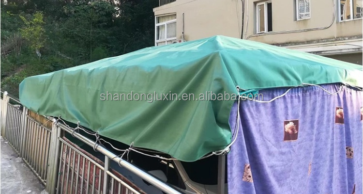 Sturdy Green PVC Tarpaulin Ideal for Blocking Sunlight and Moisture in Outdoor Settings