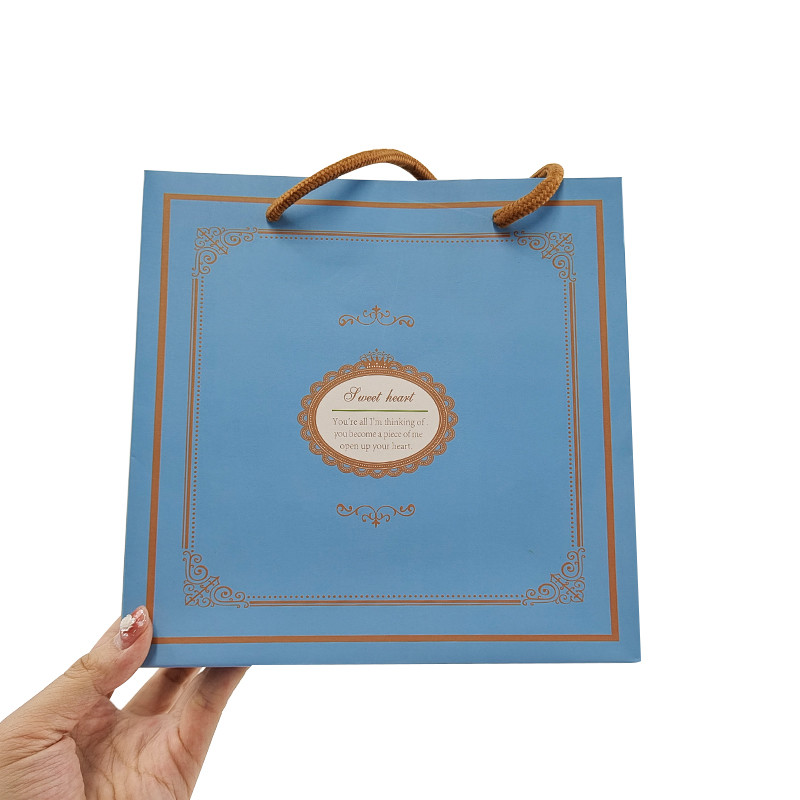 White Kraft Paper Shopping Clothing Cosmetic Perfume Gift Bag Luxury Handle Custom Logo Printed Paper Bag for Clothes