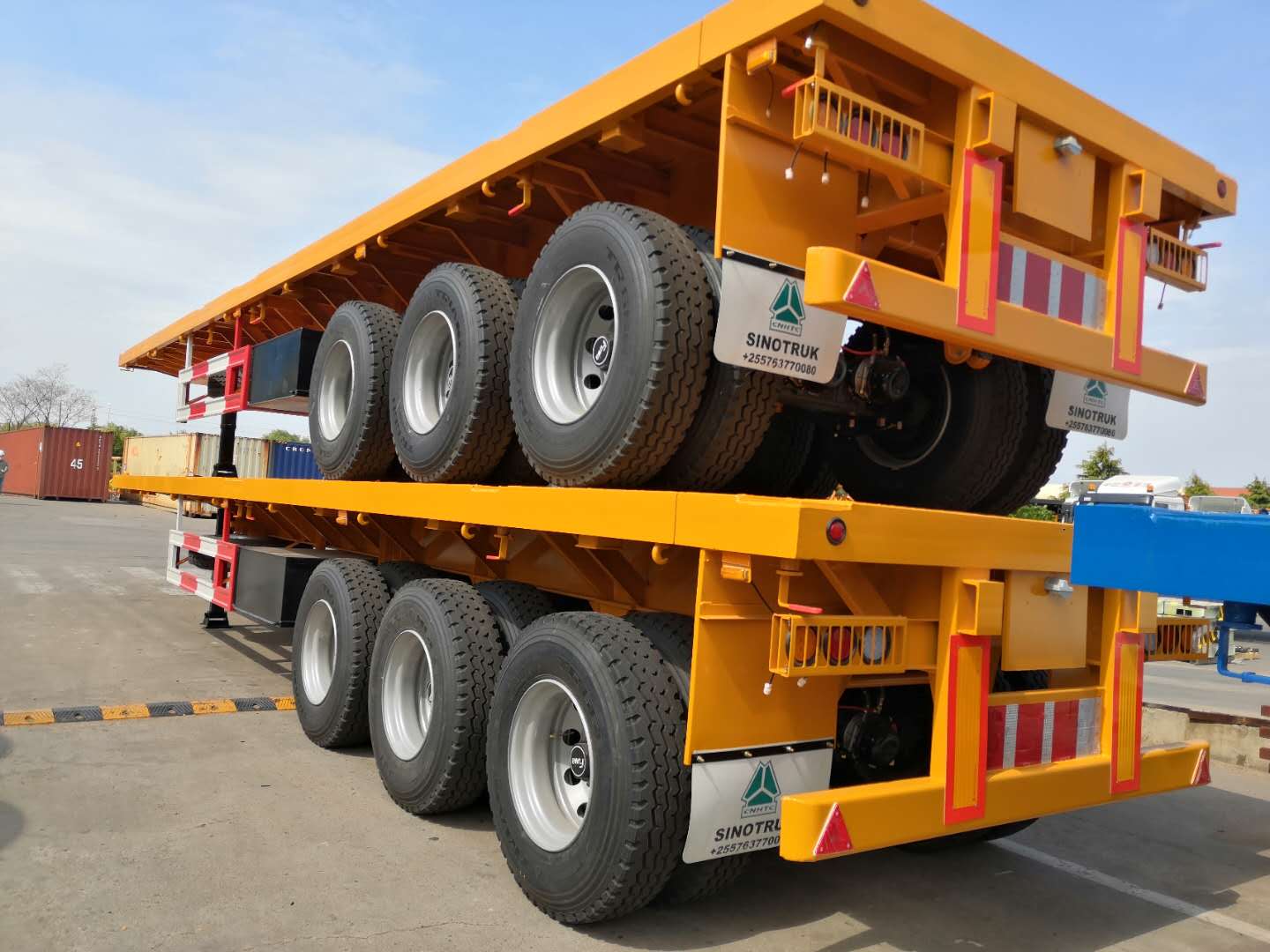 Sinotruk howo 40ft gooseneck flatbed Semi trailers Used 3 Axles Heavy duty Flat Bed self loading container trailer