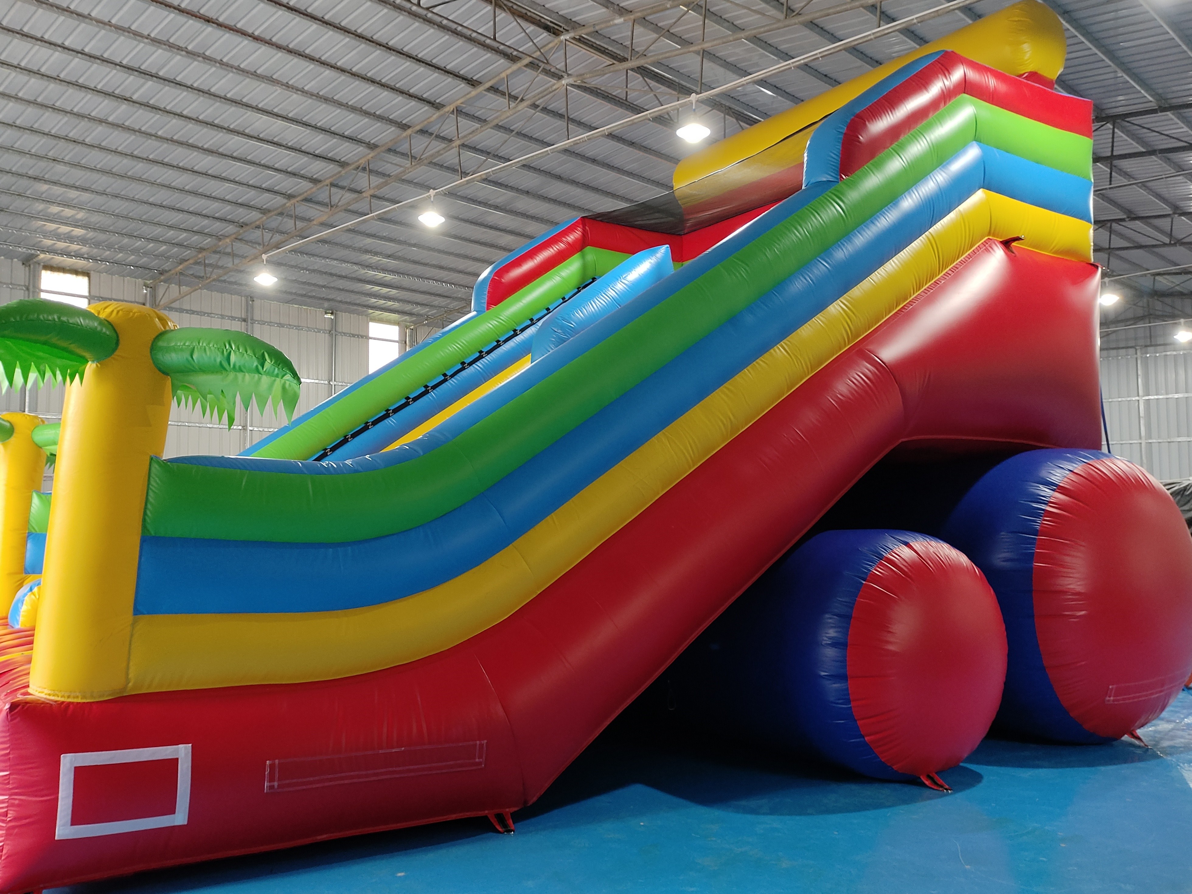 New Design Tarpaulin Fireproof Commercial Inflatable High Slide Palm Theme Giant Inflatable Slide Castle For Kids And Ad