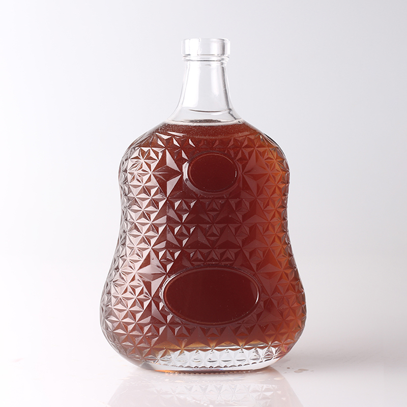 Customized Surface Handing Football Shaped Glass Bottle for Unique Alcohol Beverage