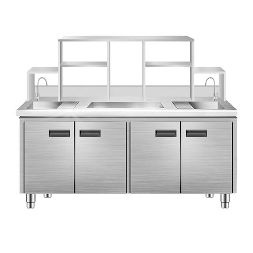 Stainless steel cabinet with double sink and storage shelves.