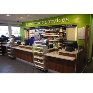  Factory customization check out counter with shelves Manufactures