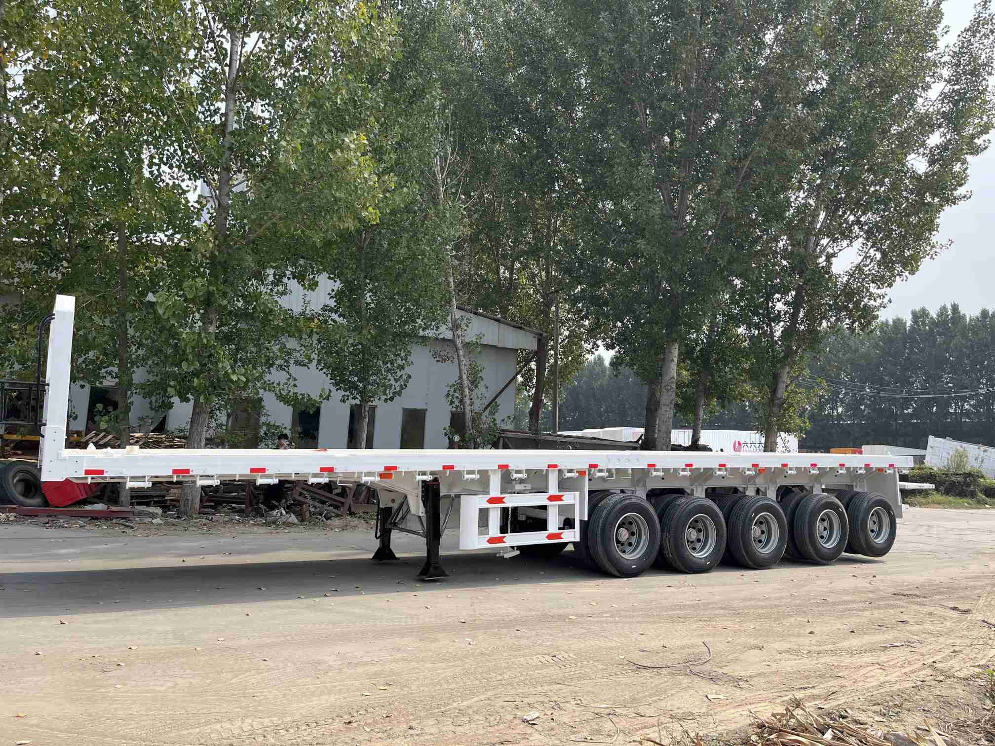 CIMC 2/3/4 axles new factory customized 12m 13m 14m 40t 60t 80t100t Africa container cargo transport flatbed deck semi trailer