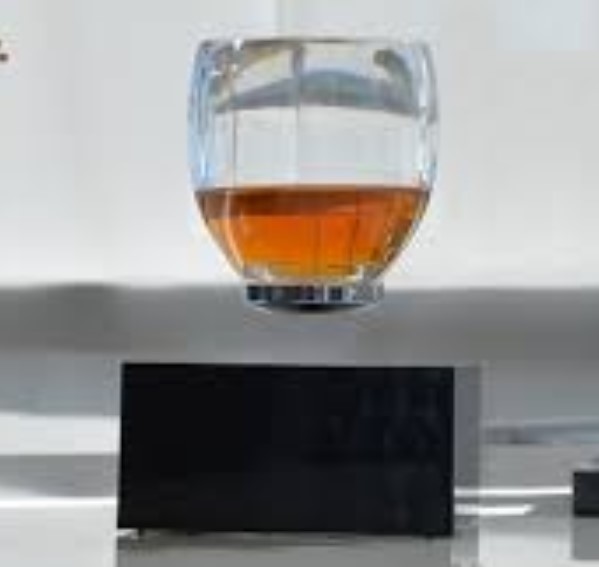 wireelss base rechargeable magnetic levitation cup glass X Zero Gravity Drinkware display racks