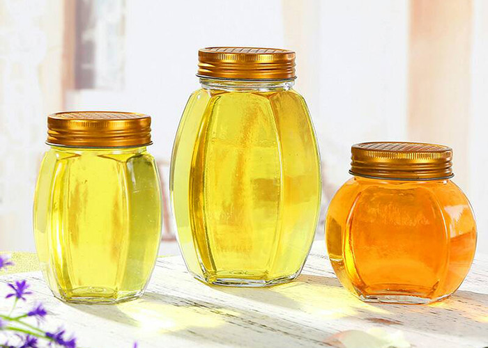 Oval Hexagonal Glass Honey Jars Transparent Color Moistureproof Feature