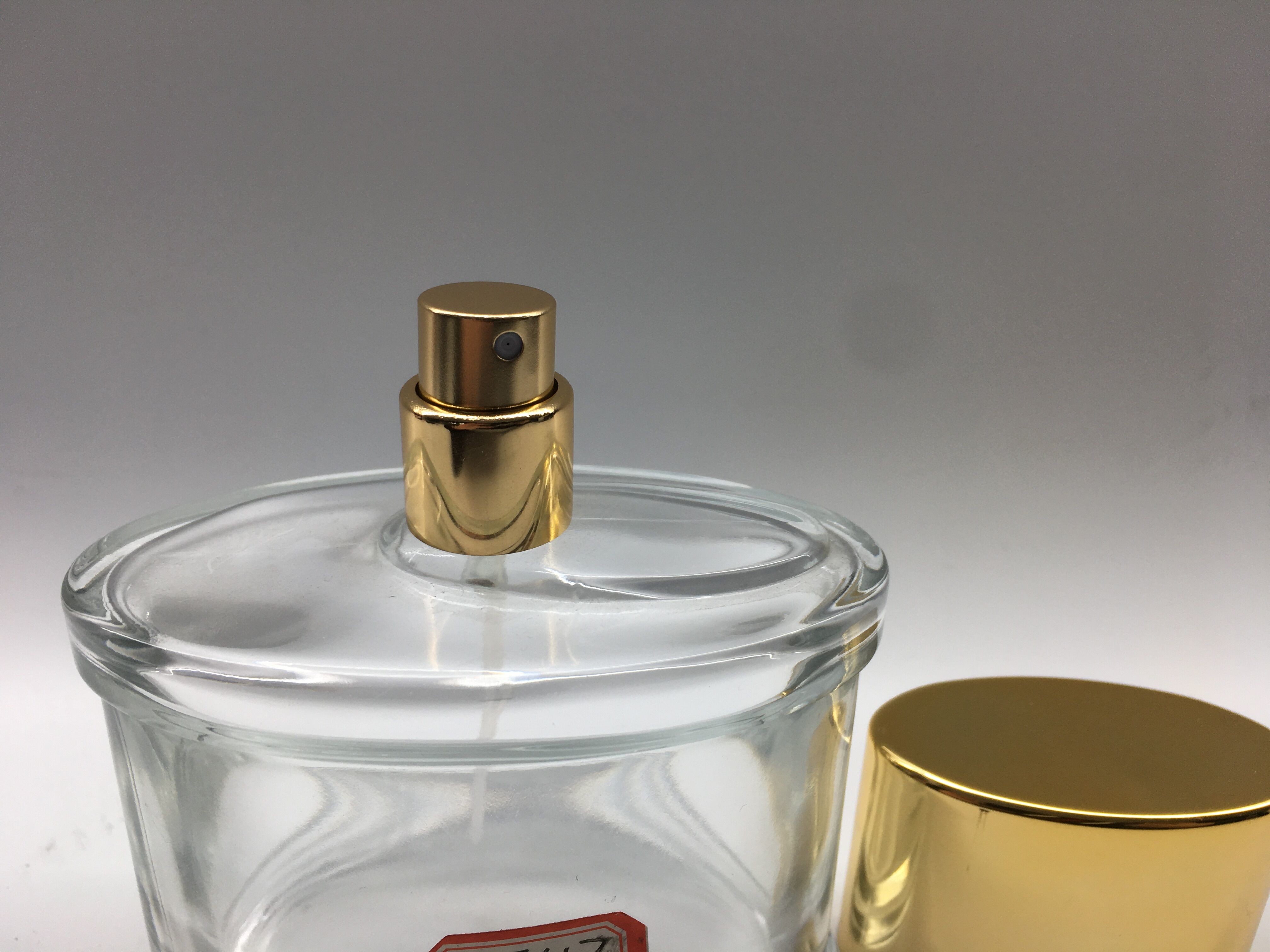 Oem Gradient Luxury Perfume Bottle Electroplating UV With Metallic Gold Atomizer