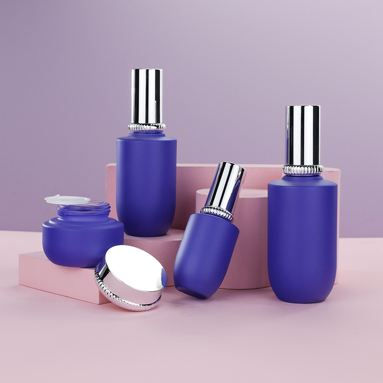 Blue 100ml ODM Glass Serum Pump Bottles With Silver Pump And Cover