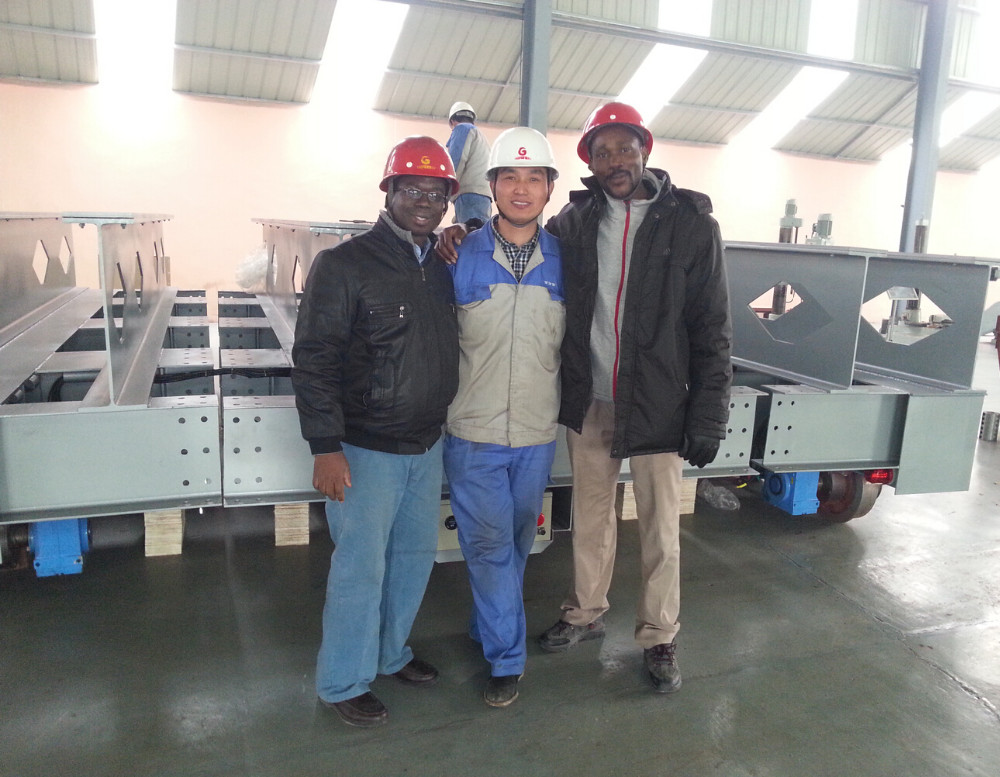 Concrete factory floor flatbed rail car with turning system