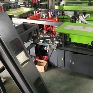 1000 KN Clamping Force Pet Automatic Blow Moulding Machine with SMC Rotary